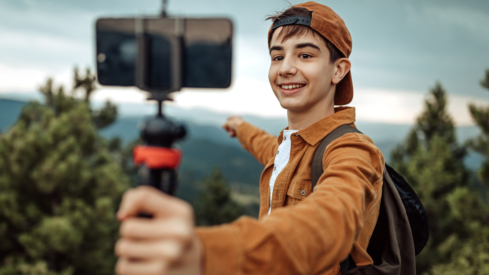 Teen Boy Recording a Video Vlog on Their Phone